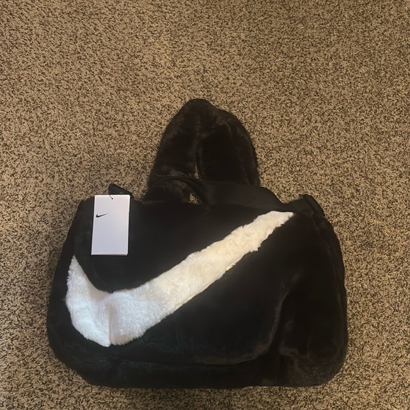 Nike Accessories - Nike Women Purse Nike Black Color. Double Handles to carry or use black straps.